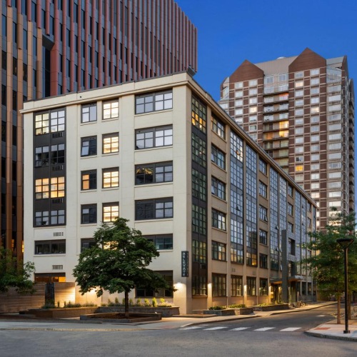 The essence of exceptional living a street with tall buildings on either side of it