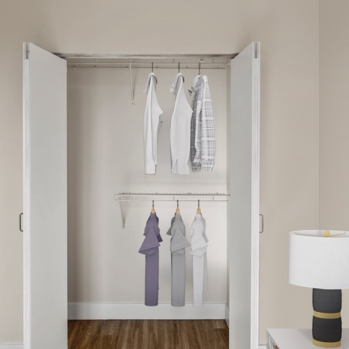 Closet space with shelves and ample lighting Closet space with shelves and ample lighting