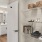 a bathroom with a bed and a toilet