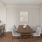 a room with a table chairs and a sink
